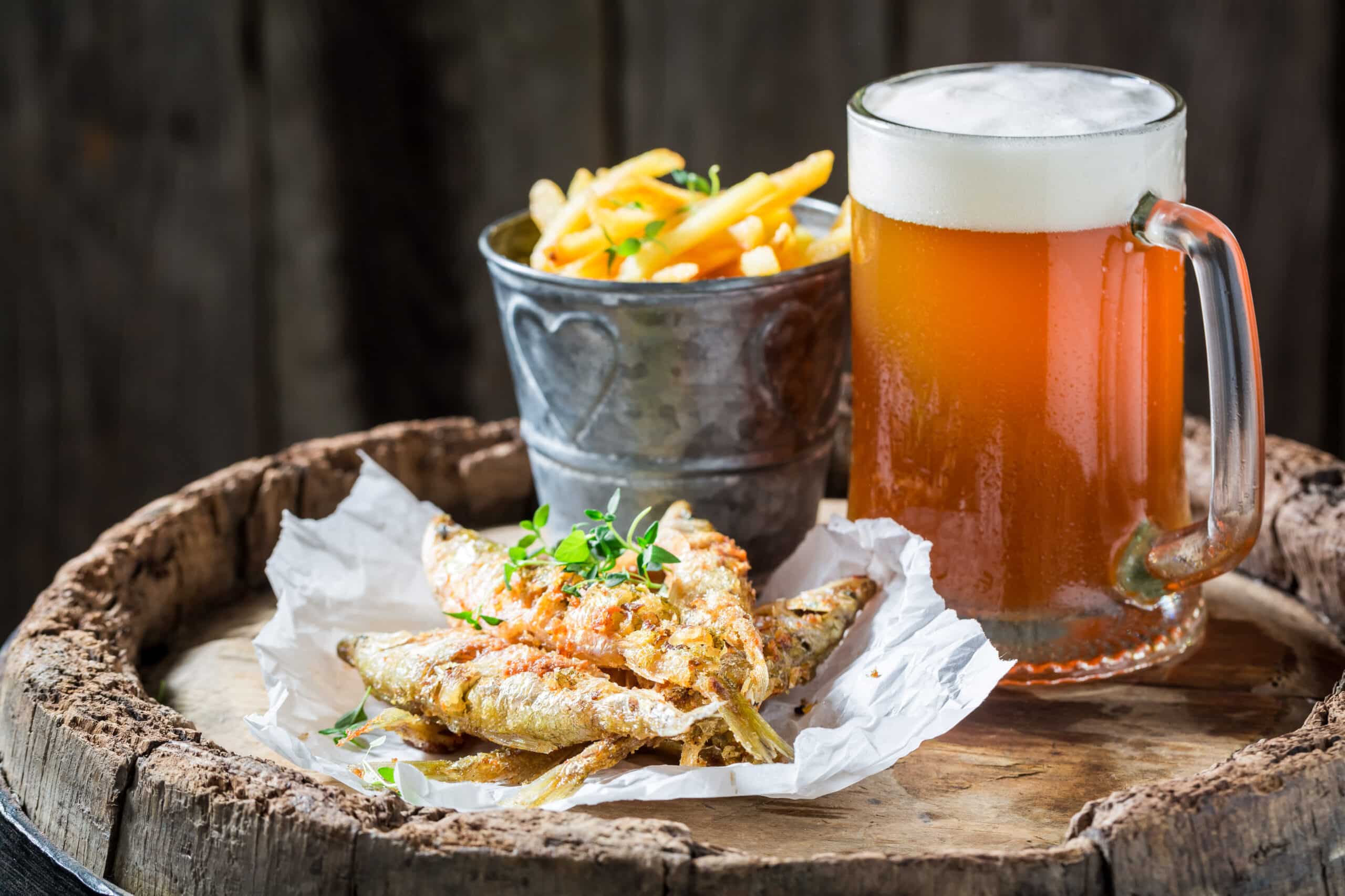 Fresh smelt fish and chips with cold beer